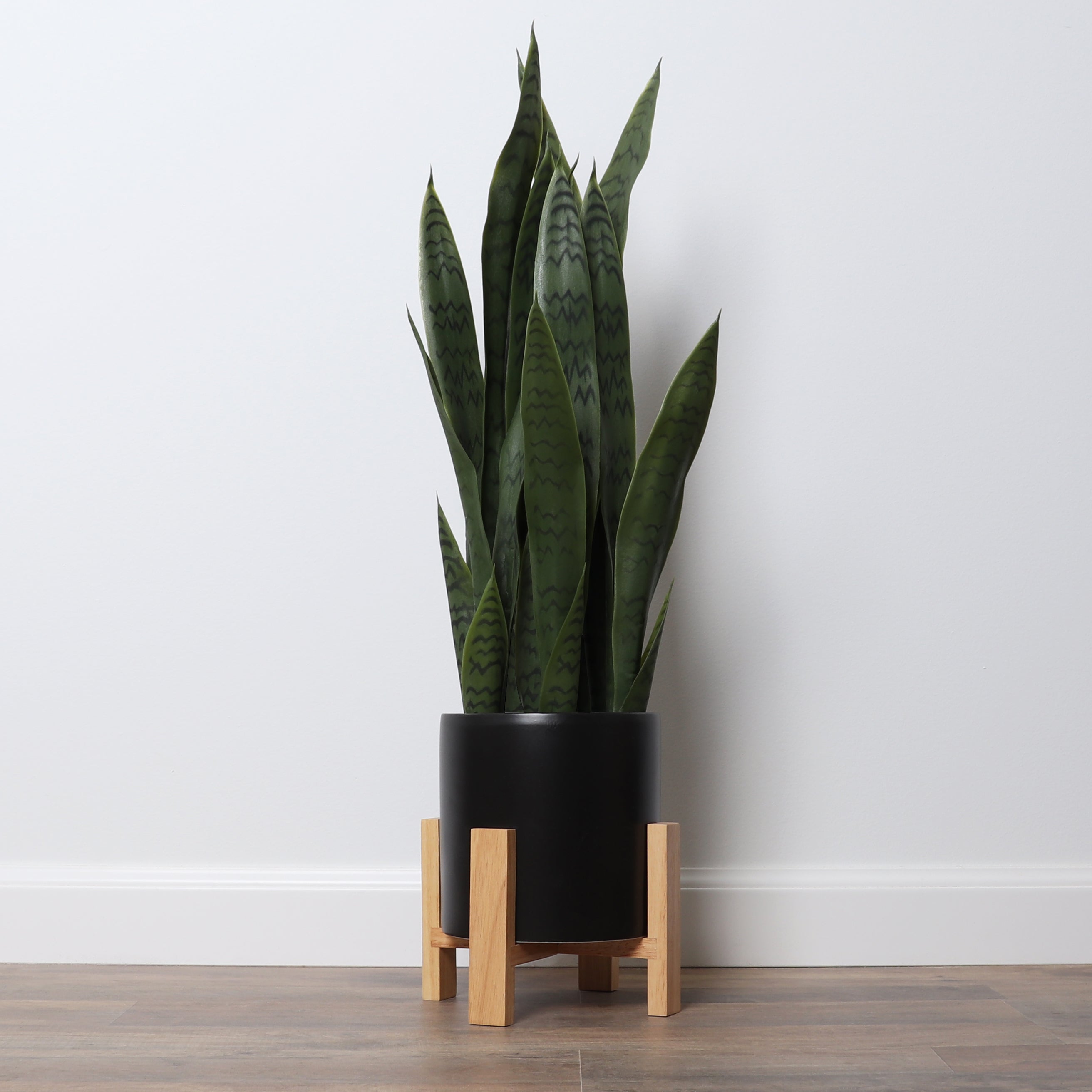 large planter for snake plant Bornbridge Large Artificial Snake Plant in Black Mid Century Ceramic Planter